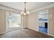 Dining room space showcasing open layout with view of the living room and kitchen at 6700 Roswell Rd # 11B, Atlanta, GA 30328