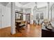 Open dining area featuring hardwood floors, modern lighting, and a breakfast nook at 1198 Piedmont Ne Ave # 103, Atlanta, GA 30309