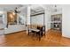 Open living space featuring hardwood floors, a kitchen island, and a comfortable seating area at 1198 Piedmont Ne Ave # 103, Atlanta, GA 30309