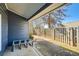 Covered patio area with a view of the fenced backyard and surrounding landscaping at 1756 Hedington Ct, Lawrenceville, GA 30045