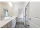 Bathroom featuring double sinks, a large mirror, and modern fixtures at 3117 W Roxboro Ne Rd, Atlanta, GA 30324