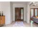 Welcoming foyer with hardwood floors, modern front door, and views into the living room at 3117 W Roxboro Ne Rd, Atlanta, GA 30324