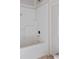 Bathroom features a white pre-fabricated shower and tub, and rough-in plumbing at 628 Sandhill Hickory Level Rd, Carrollton, GA 30116