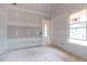 Bedroom with drywall, trim work, and a large window at 628 Sandhill Hickory Level Rd, Carrollton, GA 30116