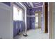 Hallway showing colorful drywall, plumbing fixtures, and natural light from windows at 628 Sandhill Hickory Level Rd, Carrollton, GA 30116