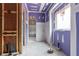 Hallway showing colorful drywall, plumbing fixtures, and natural light from windows at 628 Sandhill Hickory Level Rd, Carrollton, GA 30116