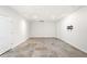 Finished basement space with tiled flooring and white walls at 733 Vinings Estates Se Dr, Mableton, GA 30126