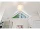 Bathroom with a triangle window above glass door shower at 733 Vinings Estates Se Dr, Mableton, GA 30126