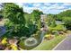 A water feature with a fountain and landscaped plants is part of the community at 733 Vinings Estates Se Dr, Mableton, GA 30126