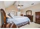 Comfortable bedroom with vaulted ceilings, large windows, and ample closet space at 2331 Rabbit Farm Cir, Loganville, GA 30052