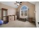 Bedroom with vaulted ceiling, bench seat, and furniture at 2331 Rabbit Farm Cir, Loganville, GA 30052