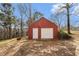 Charming detached garage with ample storage space and easy access for vehicles and equipment at 2331 Rabbit Farm Cir, Loganville, GA 30052