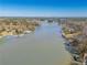 Panoramic aerial view of the waterfront homes and boat docks along the lake at 2506 Emerald Dr, Jonesboro, GA 30236