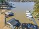 Aerial view of lakefront property with docks and boat houses at 2506 Emerald Dr, Jonesboro, GA 30236