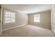 Bright bedroom with two windows offering natural light and a closet for storage at 2506 Emerald Dr, Jonesboro, GA 30236