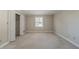 Neutral bedroom with carpet, closet, and window offers a serene space at 2506 Emerald Dr, Jonesboro, GA 30236