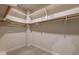 Walk-in closet with built-in shelving for optimized storage solutions at 2506 Emerald Dr, Jonesboro, GA 30236