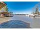 Expansive lake view showcasing multiple covered boat docks on a sunny day at 2506 Emerald Dr, Jonesboro, GA 30236