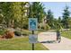 Scenic bike path featuring smooth pavement, lush greenery, mature trees, and a biker enjoying the trail at 630 Oakdale Ne Rd, Atlanta, GA 30307