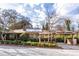 Charming single-story home with a carport, lovely landscaping, and solar panels on the roof at 630 Oakdale Ne Rd, Atlanta, GA 30307