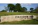 Welcome to Freedom Park sign with lush green landscape and a glimpse of neighborhood homes at 630 Oakdale Ne Rd, Atlanta, GA 30307