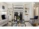 Elegant living room with a fireplace and custom built-in shelving at 630 Oakdale Ne Rd, Atlanta, GA 30307