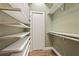 Walk-in closet with custom shelving for optimal storage at 630 Oakdale Ne Rd, Atlanta, GA 30307