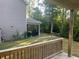 Backyard with covered patio area and a wooden fence at 3965 Grandview Vista St, Cumming, GA 30028