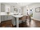 Well-lit kitchen with island seating, stainless appliances, and seamless flow to the back deck at 2005 Haley Walk, Woodstock, GA 30188