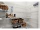 Well-organized pantry with white wire shelving providing ample storage space for food and household items at 2005 Haley Walk, Woodstock, GA 30188