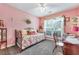 Pink bedroom with window, desk, and daybed at 2895 Dogwood Creek Pkwy, Duluth, GA 30096