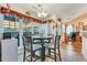 Eat-in breakfast area with lots of natural light. Dining set and wooded view at 2895 Dogwood Creek Pkwy, Duluth, GA 30096