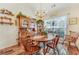 Charming dining room featuring hardwood floors, natural light, and a decorative chandelier at 2895 Dogwood Creek Pkwy, Duluth, GA 30096