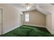 Bedroom with neutral walls and green carpet, window with shutters and a ceiling fan at 3786 Turnberry Ct, Duluth, GA 30096