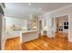 Modern kitchen featuring granite countertops, stainless steel appliances, and an island at 3786 Turnberry Ct, Duluth, GA 30096