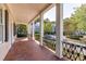 Covered porch with brick flooring and views of the community at 3786 Turnberry Ct, Duluth, GA 30096