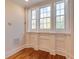 A charming window seat area with natural light. Hardwood floors and detailed moldings at 3786 Turnberry Ct, Duluth, GA 30096