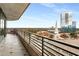Expansive balcony offering views of the surrounding buildings and skyline for relaxing or entertaining at 750 Park Ne Ave # 14Se, Atlanta, GA 30326
