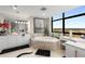 Bright bathroom with large window, soaking tub, vanity, and modern fixtures at 750 Park Ne Ave # 14Se, Atlanta, GA 30326