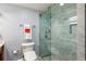 Modern bathroom featuring a glass-enclosed shower with marble tile and sleek fixtures, providing a spa-like experience at 750 Park Ne Ave # 14Se, Atlanta, GA 30326