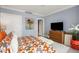 Comfortable bedroom with a TV and ample closet space, offering both entertainment and storage solutions at 750 Park Ne Ave # 14Se, Atlanta, GA 30326