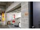 View of a garage with parking space including two cars and the storage system on the left at 750 Park Ne Ave # 14Se, Atlanta, GA 30326