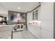 An elegant kitchen with white cabinetry, marble counters, and stylish decor at 750 Park Ne Ave # 14Se, Atlanta, GA 30326