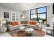 A cozy living room with a large window, stylish furniture, and plenty of natural light at 750 Park Ne Ave # 14Se, Atlanta, GA 30326