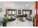 Bright open living space with grand piano, dining area and city views at 750 Park Ne Ave # 14Se, Atlanta, GA 30326