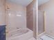 Elegant bathroom with a corner bathtub and separate glass-enclosed shower, exuding luxury and comfort at 192 Maple Wood Dr, Lawrenceville, GA 30046