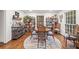 Cozy dining area with a bar and shelving at 192 Maple Wood Dr, Lawrenceville, GA 30046