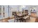 Charming dining room with a fireplace, chandelier and french doors at 192 Maple Wood Dr, Lawrenceville, GA 30046