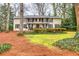 Charming two-story home with a welcoming front yard and manicured greenery at 192 Maple Wood Dr, Lawrenceville, GA 30046