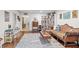 Comfortable living room with lots of natural light and a large area rug at 192 Maple Wood Dr, Lawrenceville, GA 30046